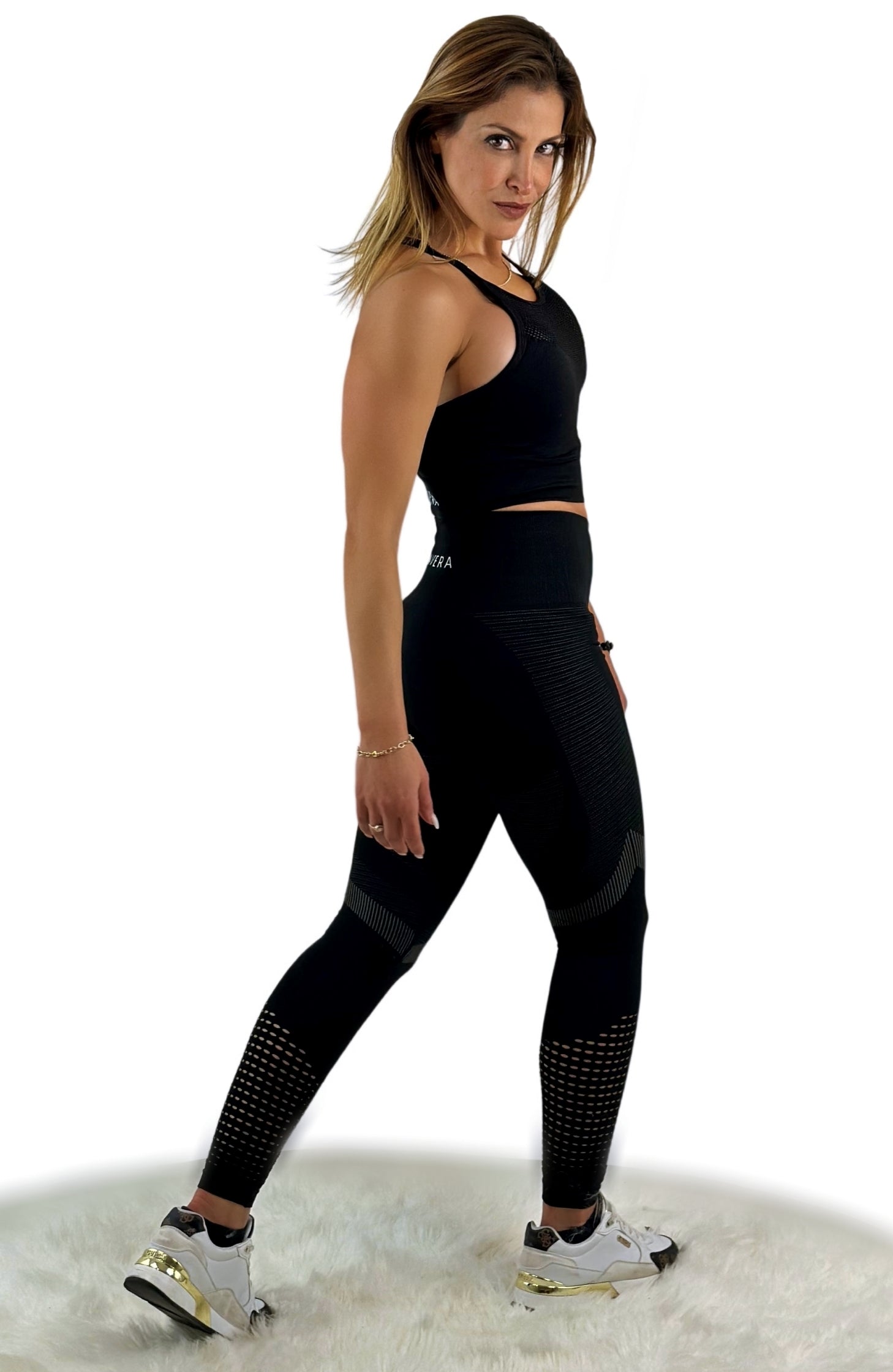 Sym Mesh Leggings – Black | Seamless, breathable performance leggings with mesh detail for sculpted comfort and modern style