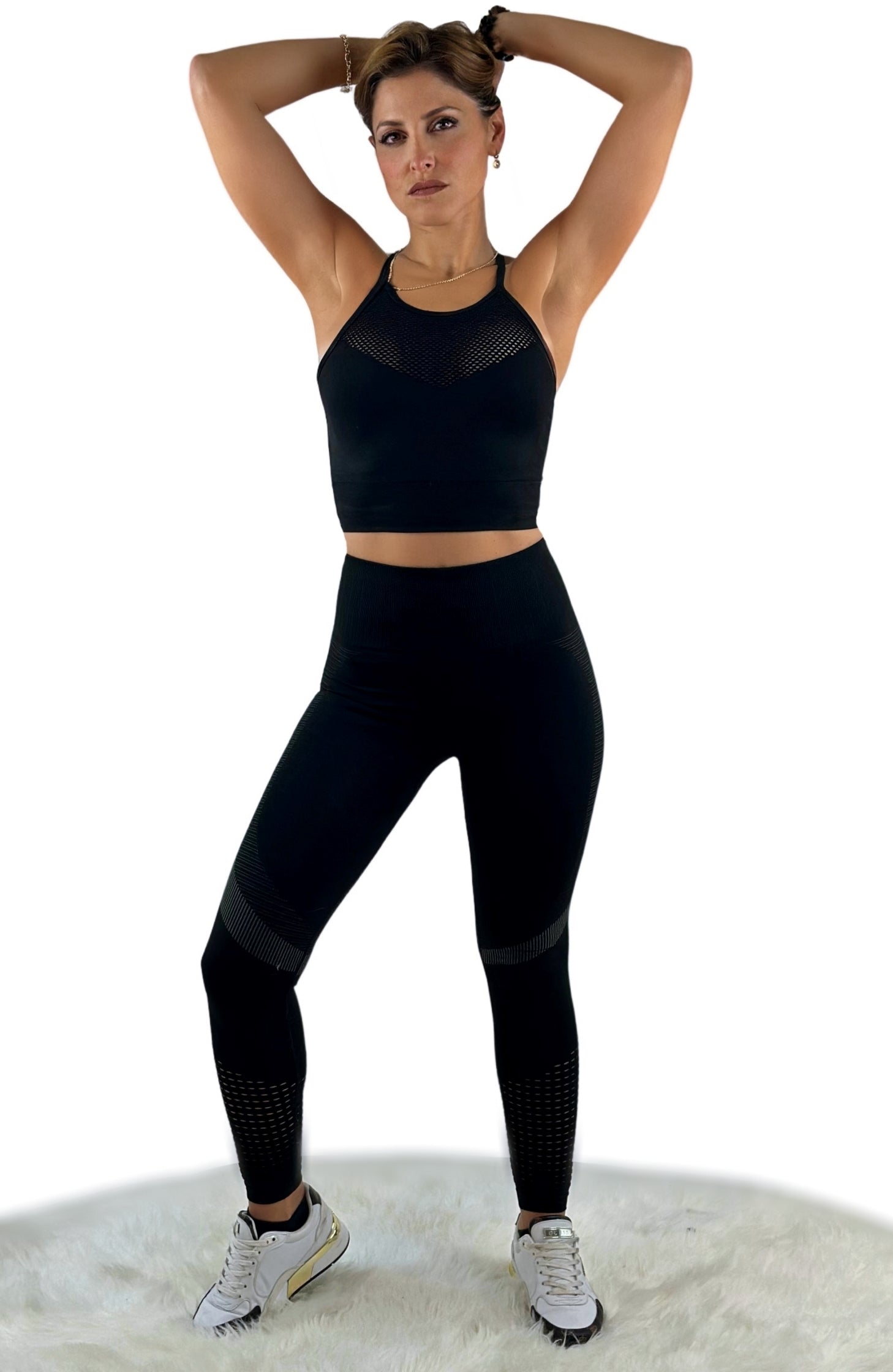 Sym Mesh Sport Top – Black | Seamless, breathable activewear with mesh detail for elevated performance and style